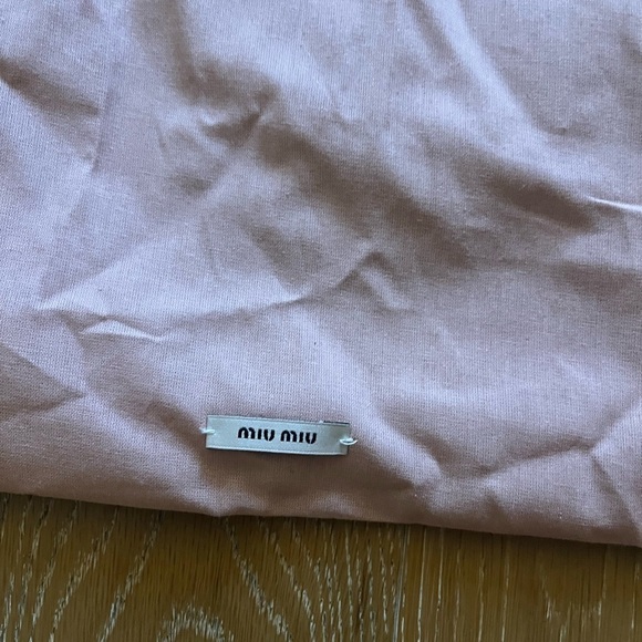 Miu Miu Accessories - Two authentic Miu Miu dustbag for shoes. Barely Used.